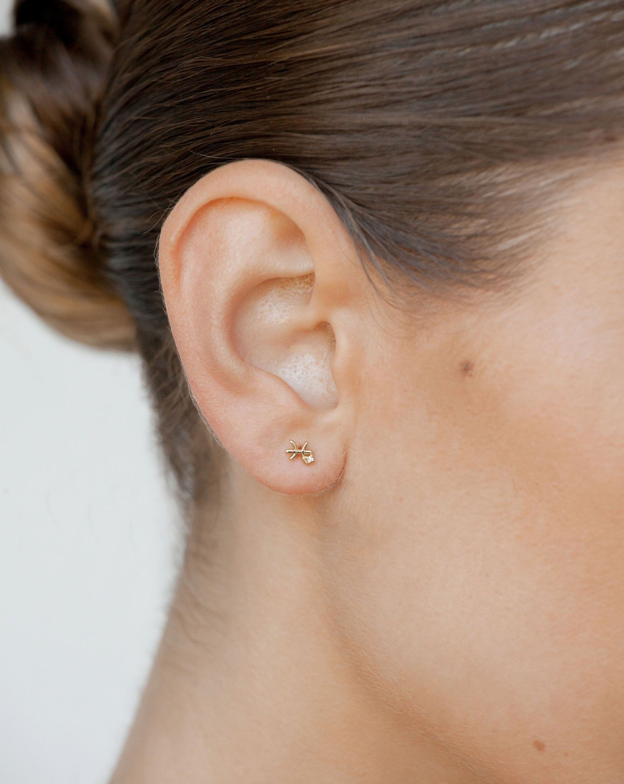 Pendientes con símbolo de Piscis